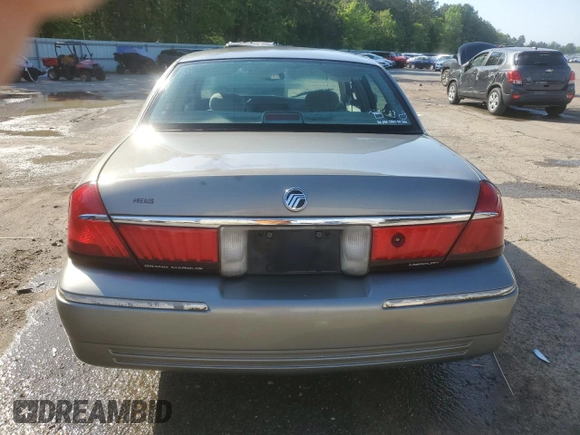 1999 Mercury Grand Marquis LS z VIN 2MEFM75W9XX687526, wystawiony jako Copart lot #51779995 z przebiegiem 196 466 mil mil oraz Szkoda całkowita • Salvage title. Historia ofert i sprzedaży dostępna na DreamBid. Obrazek 6.