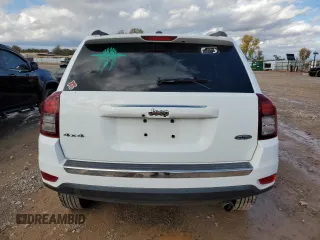 2016 Jeep Compass High Altitude with VIN 1C4NJDEB3GD797691, listed as a Copart auction lot 80340604 with 95,404 mi miles and Salvage title. Bid and sale history available at DreamBid. Image 6.