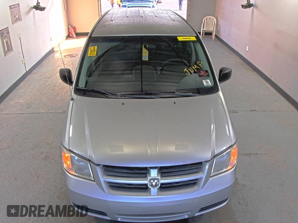 2010 Dodge Grand Caravan SE z VIN 2D4RN4DEXAR412152, wystawiony jako IAAI lot #42825395 z przebiegiem 93 398 mil mil oraz . Historia ofert i sprzedaży dostępna na DreamBid. Obrazek 35.