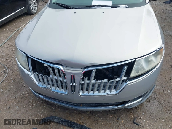 2010 Lincoln MKZ z VIN 3LNHL2GC5AR605750, wystawiony jako IAAI lot #41542836 z przebiegiem 146 347 mil mil oraz . Historia ofert i sprzedaży dostępna na DreamBid. Obrazek 6.