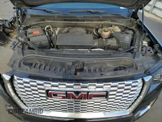 2021 GMC Yukon XL Denali z VIN 1GKS2JKL7MR242953, wystawiony jako Copart lot #52175335 z przebiegiem 141 890 mil mil oraz Szkody całkowita. Historia ofert i sprzedaży dostępna na DreamBid. Obrazek 13.