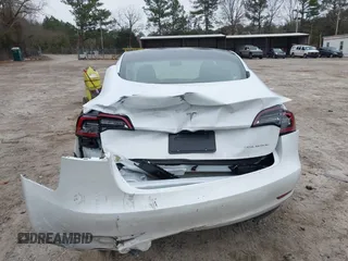 2023 Tesla Model 3 Long Range with VIN 5YJ3E1EB9PF393622, listed as a IAAI auction lot 41207132 with 14,097 mi miles and . Bid and sale history available at DreamBid. Image 16.