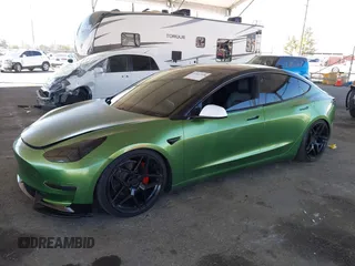 2020 Tesla Model 3 Standard Range Plus with VIN 5YJ3E1EA4LF799650, listed as a IAAI auction lot 41817538 with 54,835 mi miles. Bid and sale history available at carsss.com. Image 17.
