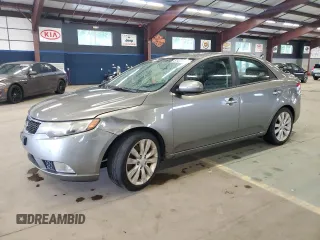 2012 Kia Forte SX с VIN KNAFW4A3XC5498625, выставлен на аукционе Copart как лот 61411685 с пробегом 220 698 миль миль и Списание • Salvage title. История ставок и продаж доступна на DreamBid. Изображение 1.