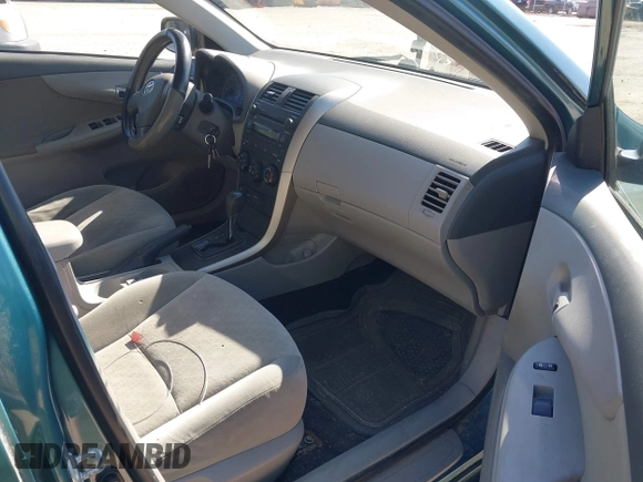 2009 Toyota Corolla with VIN JTDBL40E299037014, listed as a IAAI auction lot 42078954 with 86,559 mi miles. Bid and sale history available at carsss.com. Image 5.