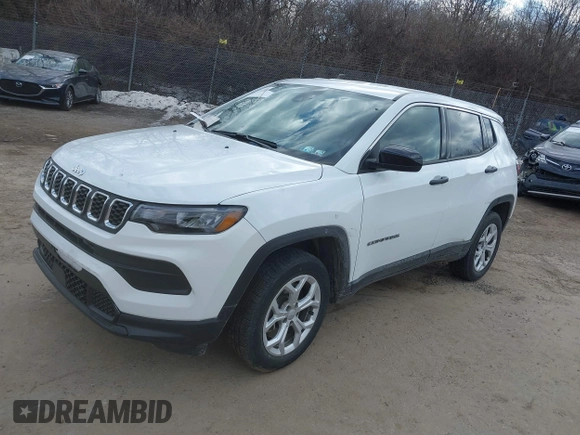 2024 Jeep Compass Sport z VIN 3C4NJDAN2RT157145, wystawiony jako IAAI lot #41456201 z przebiegiem 6 943 mil mil oraz . Historia ofert i sprzedaży dostępna na DreamBid. Obrazek 6.