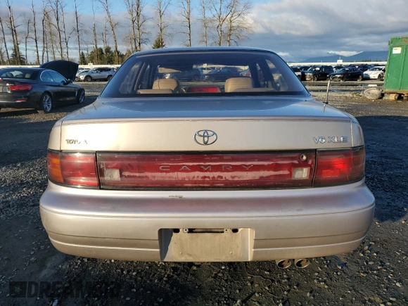 1994 Toyota Camry XLE with VIN JT2GK13E0R0038694, listed as a Copart auction lot 87843865 with 175,134 mi miles and Salvage Title. Bid and sale history available at carsss.com. Image 6.