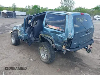 1997 Jeep Cherokee Sport with VIN 1J4FJ68S8VL557562, listed as a IAAI auction lot 42157736 with Not provided miles and . Bid and sale history available at DreamBid. Image 3.
