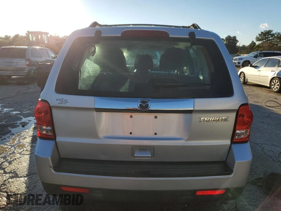 2010 Mazda Tribute Grand Touring with VIN 4F2CY0C74AKM03659, listed as a Copart auction lot 84494254 with 160,177 mi miles and Salvage Title. Bid and sale history available at carsss.com. Image 6.