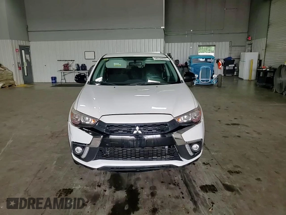 2018 Mitsubishi Outlander ES z VIN JA4AP3AUXJU016309, wystawiony jako Copart lot #58558895 z przebiegiem 68 421 mil mil oraz Szkoda całkowita • Salvage title. Historia ofert i sprzedaży dostępna na DreamBid. Obrazek 15.