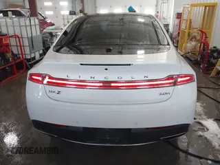 2017 Lincoln MKZ Hybrid Reserve with VIN 3LN6L5MU0HR603355, listed as a IAAI auction lot 41720619 with 142,241 mi miles. Bid and sale history available at carsss.com. Image 17.