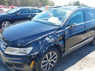 2020 Volkswagen Tiguan SE with VIN 3VV3B7AX1LM139519, listed as a IAAI auction lot 41890276 with 147,303 mi miles and . Bid and sale history available at DreamBid. Image 6.