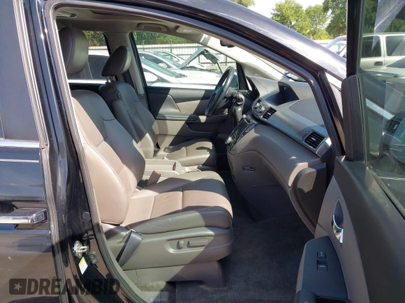 2016 Honda Odyssey EX-L with VIN 5FNRL5H61GB089853, listed as a IAAI auction lot 42019081 with 81,317 mi miles and . Bid and sale history available at DreamBid. Image 5.