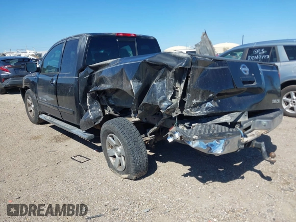 2005 Nissan Titan XE with VIN 1N6BA06A15N560400, listed as a IAAI auction lot 41656560 with 212,568 mi miles. Bid and sale history available at carsss.com. Image 3.