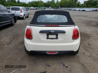 2019 MINI Convertible Cooper с VIN WMWWG5C57K3D01554, выставлен на аукционе Copart как лот 57497795 с пробегом 98 158 миль миль и Списание • Salvage title. История ставок и продаж доступна на DreamBid. Изображение 6.