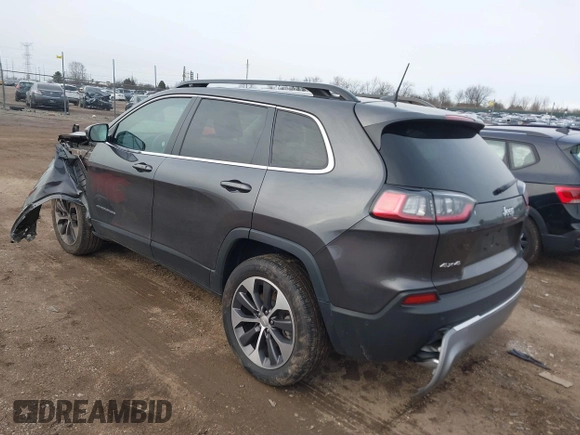 2022 Jeep Cherokee Limited with VIN 1C4PJMDX2ND501286, listed as a IAAI auction lot 41196619 with 54,975 mi miles and . Bid and sale history available at DreamBid. Image 3.