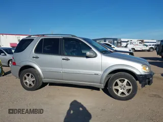 2003 Mercedes-Benz M-Class 3.2L with VIN 4JGAB54E03A383496, listed as a IAAI auction lot 41327756 with 162,973 mi miles. Bid and sale history available at carsss.com. Image 13.
