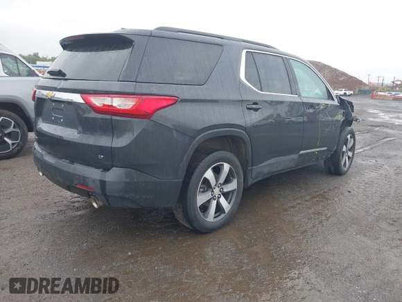 2021 Chevrolet Traverse LT z VIN 1GNEVHKW2MJ195002, wystawiony jako IAAI lot #42314214 z przebiegiem 50 877 mil mil oraz . Historia ofert i sprzedaży dostępna na DreamBid. Obrazek 4.