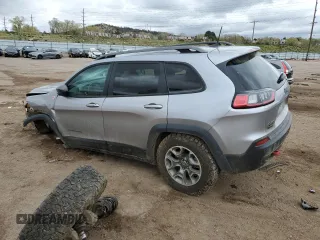 2021 Jeep Cherokee Trailhawk with VIN 1C4PJMBX2MD143446, listed as a Copart auction lot 55166945 with 83,841 mi miles and Salvage title. Bid and sale history available at DreamBid. Image 2.