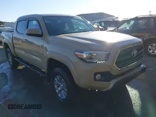 2017 Toyota Tacoma SR5 with VIN 3TMCZ5ANXHM088347, listed as a IAAI auction lot 41591318 with 103,800 mi miles and . Bid and sale history available at DreamBid. Image 1.