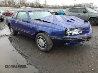 1988 Ford Thunderbird with VIN 1FABP64T6JH176166, listed as a Copart auction lot 84049064 with 80,091 mi miles and Salvage Title. Bid and sale history available at DreamBid. Image 4.