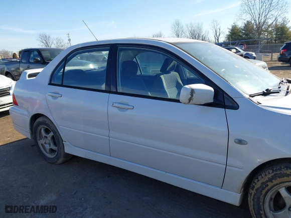 2003 Mitsubishi Lancer OZ-Rally with VIN JA3AJ86E13U100350, listed as a IAAI auction lot 41584874 with 244,945 mi miles. Bid and sale history available at carsss.com. Image 13.