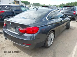 2015 BMW 4 Series 428i z VIN WBA3N3C53FK233680, wystawiony jako IAAI lot #42325131 z przebiegiem 103 632 mil mil oraz . Historia ofert i sprzedaży dostępna na DreamBid. Obrazek 4.