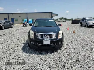 2013 Cadillac SRX Performance Collection with VIN 3GYFNHE37DS649235, listed as a Copart auction lot 56939285 with 104,692 mi miles and Salvage title. Bid and sale history available at DreamBid. Image 14.
