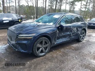 2022 Genesis GV70 Sport z VIN KMUMCDTC3NU074029, wystawiony jako IAAI lot #41400987 z przebiegiem 29 494 mil mil oraz . Historia ofert i sprzedaży dostępna na DreamBid. Obrazek 17.