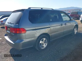 1999 Honda Odyssey EX with VIN 2HKRL1868XH534664, listed as a IAAI auction lot 42650005 with 96,229 mi miles and . Bid and sale history available at DreamBid. Image 4.