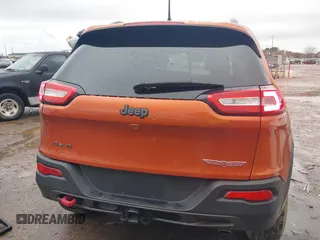 2016 Jeep Cherokee Trailhawk z VIN 1C4PJMBS0GW155379, wystawiony jako IAAI lot #41472352 z przebiegiem 116 036 mil mil oraz . Historia ofert i sprzedaży dostępna na DreamBid. Obrazek 16.