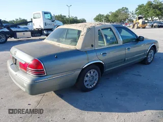 2005 Mercury Grand Marquis GS with VIN 2MEFM74WX5X627625, listed as a IAAI auction lot 41982651 with 87,044 mi miles and . Bid and sale history available at DreamBid. Image 4.