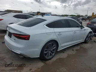 2023 Audi A5 Sportback S line Premium z VIN WAUDACF54PA024628, wystawiony jako Copart lot #49966604 z przebiegiem 15 396 mil mil oraz Czysty tytuł • Clean title. Historia ofert i sprzedaży dostępna na DreamBid. Obrazek 3.