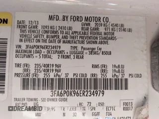 2014 Ford Fusion Titanium with VIN 3FA6P0K96ER234979, listed as a IAAI auction lot 41220106 with 98,068 mi miles. Bid and sale history available at carsss.com. Image 9.