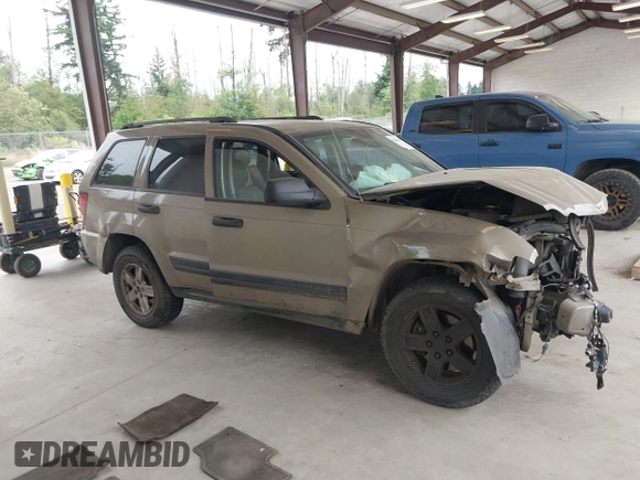 2005 Jeep Grand Cherokee Laredo with VIN 1J4GR48KX5C589625, listed as a IAAI auction lot 42699102 with Not provided miles and . Bid and sale history available at DreamBid. Image 14.