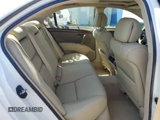 2006 Acura RL z VIN JH4KB16576C012132, wystawiony jako Copart lot #61897805 z przebiegiem 143 101 mil mil oraz Szkoda całkowita • Salvage title. Historia ofert i sprzedaży dostępna na DreamBid. Obrazek 10.