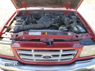 2002 Ford Ranger XLT Appearance with VIN 1FTYR44E32PA07430, listed as a Copart auction lot 54067335 with 209,433 mi miles and Salvage title. Bid and sale history available at DreamBid. Image 11.