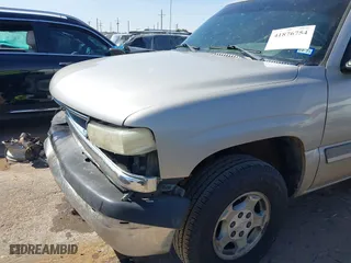2005 Chevrolet Tahoe LS with VIN 1GNEC13V25R270657, listed as a IAAI auction lot 41876754 with 338,698 mi miles. Bid and sale history available at carsss.com. Image 6.