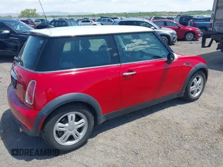 2006 MINI Hardtop with VIN WMWRC33556TK72619, listed as a IAAI auction lot 42328177 with 106,398 mi miles and . Bid and sale history available at DreamBid. Image 4.