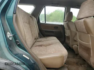 2003 Honda CR-V LX z VIN JHLRD78413C004656, wystawiony jako Copart lot #53993725 z przebiegiem 219 629 mil mil oraz Czysty tytuł • Clean title. Historia ofert i sprzedaży dostępna na DreamBid. Obrazek 10.