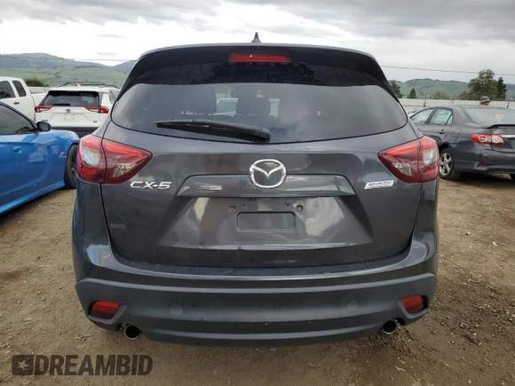 2016 Mazda CX-5 Grand Touring with VIN JM3KE2DY4G0795271, listed as a Copart auction lot 50986845 with 92,323 mi miles and Salvage Title. Bid and sale history available at carsss.com. Image 6.