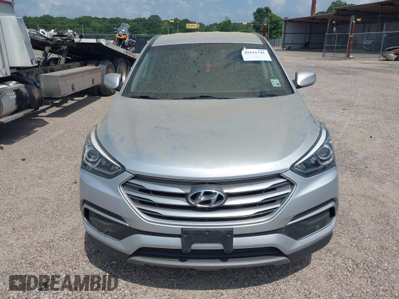 2018 Hyundai Santa Fe 2.4L with VIN 5XYZT3LB4JG557373, listed as a IAAI auction lot 42511741 with 142,572 mi miles and . Bid and sale history available at DreamBid. Image 6.