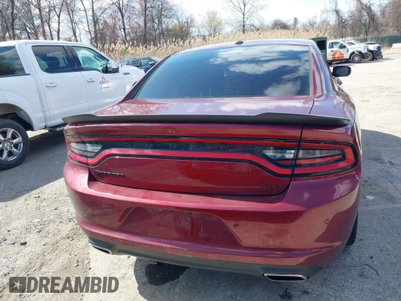 2021 Dodge Charger SXT with VIN 2C3CDXBG2MH616146, listed as a IAAI auction lot 41893157 with 64,676 mi miles. Bid and sale history available at carsss.com. Image 17.