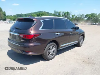 2019 Infiniti QX60 Luxe z VIN 5N1DL0MM0KC569160, wystawiony jako IAAI lot #42580368 z przebiegiem 32 923 mil mil oraz . Historia ofert i sprzedaży dostępna na DreamBid. Obrazek 4.