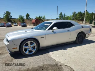 2012 Dodge Challenger R/T z VIN 2C3CDYBT0CH259731, wystawiony jako Copart lot #58033035 z przebiegiem 142 427 mil mil oraz Czysty tytuł • Clean title. Historia ofert i sprzedaży dostępna na DreamBid. Obrazek 1.
