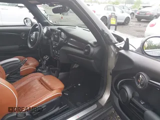 2016 MINI Convertible S z VIN WMWWG9C53G3A91095, wystawiony jako IAAI lot #42283353 z przebiegiem Nie podano mil oraz . Historia ofert i sprzedaży dostępna na DreamBid. Obrazek 5.