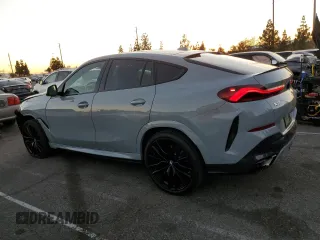 2024 BMW X6 xDrive40i with VIN 5UX33EX04R9T50214, listed as a Copart auction lot 85332204 with 8,710 mi miles and Salvage Title. Bid and sale history available at carsss.com. Image 2.