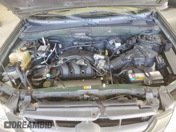 2002 Mazda Tribute LX with VIN 4F2YU09142KM39082, listed as a Copart auction lot 49973375 with 128,002 mi miles and Clean Title. Bid and sale history available at carsss.com. Image 13.