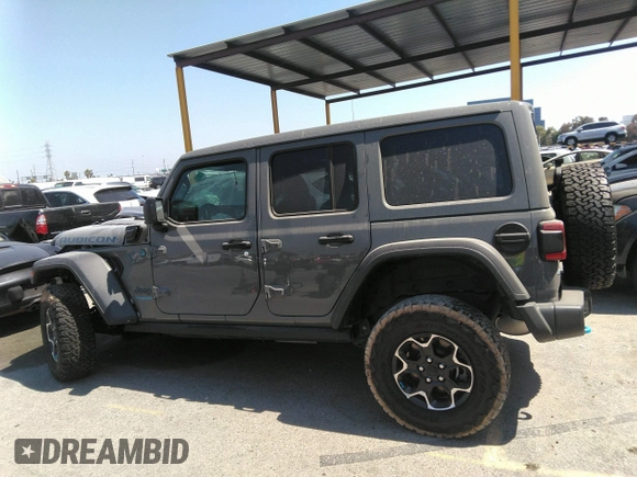 2022 Jeep Wrangler Unlimited Rubicon with VIN 1C4JJXR60NW182756, listed as a IAAI auction lot 36927414 with Not provided miles and . Bid and sale history available at DreamBid. Image 14.