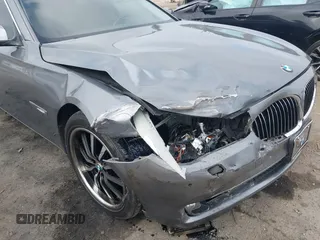 2012 BMW 7 Series 740i with VIN WBAKA4C52CC613676, listed as a IAAI auction lot 42509312 with 113,971 mi miles and . Bid and sale history available at DreamBid. Image 6.